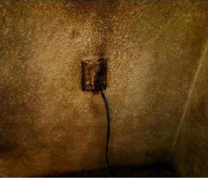 soot damage on wall 