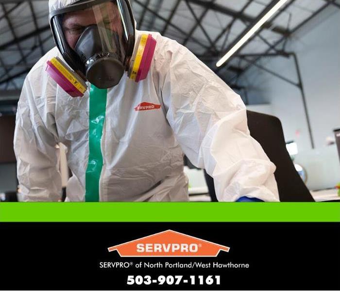 SERVPRO cleaning technician in PPE 