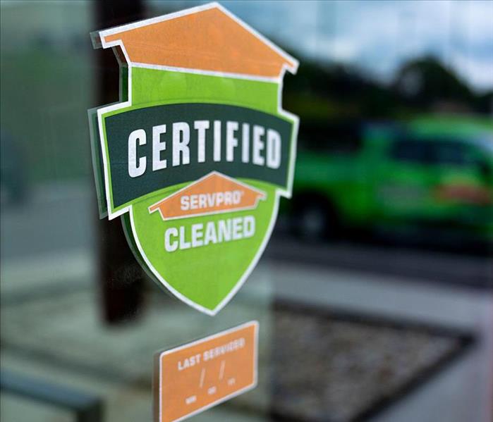 Certified: SERVPRO Cleaned sticker on window 